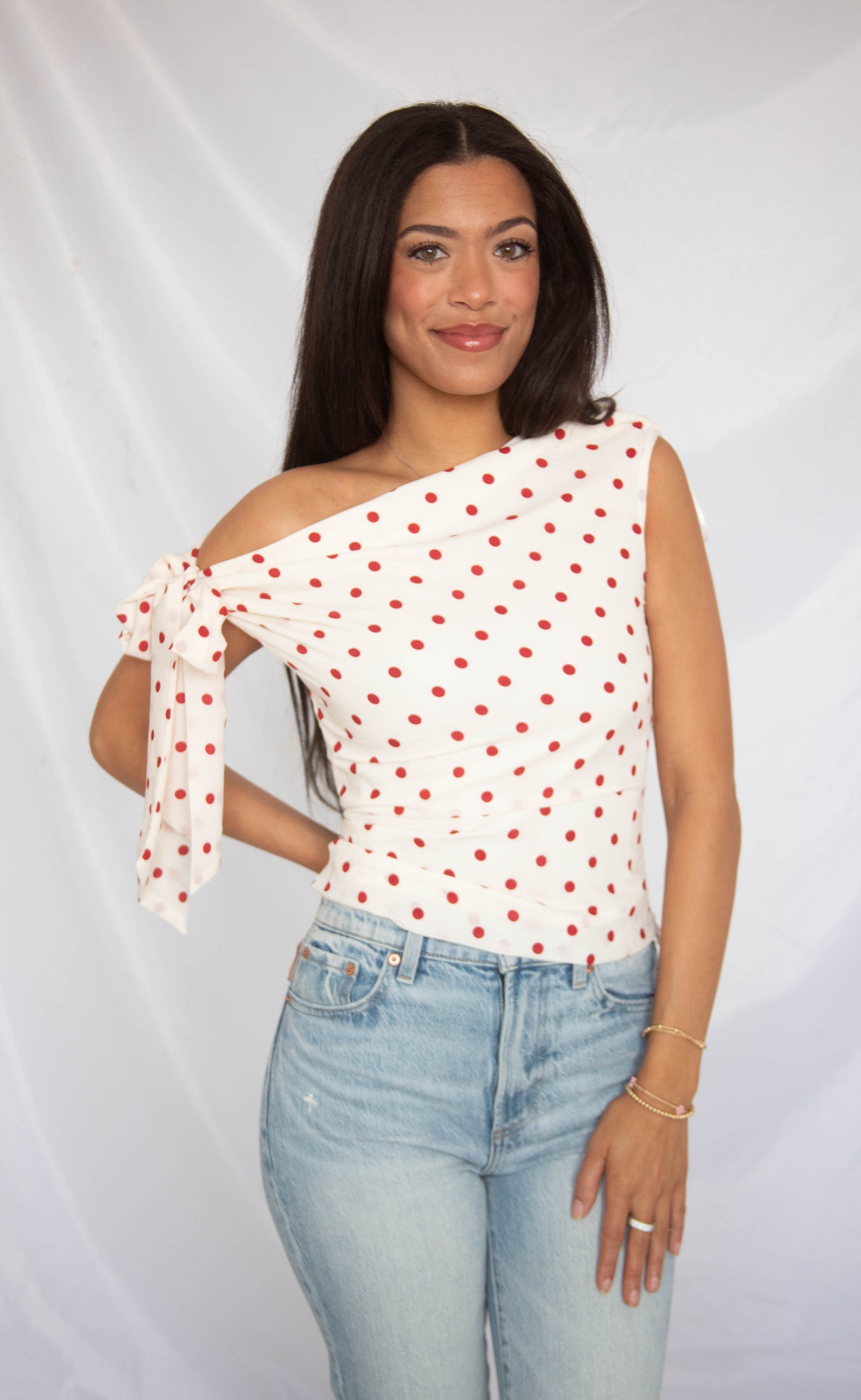 slipping away polka dot top